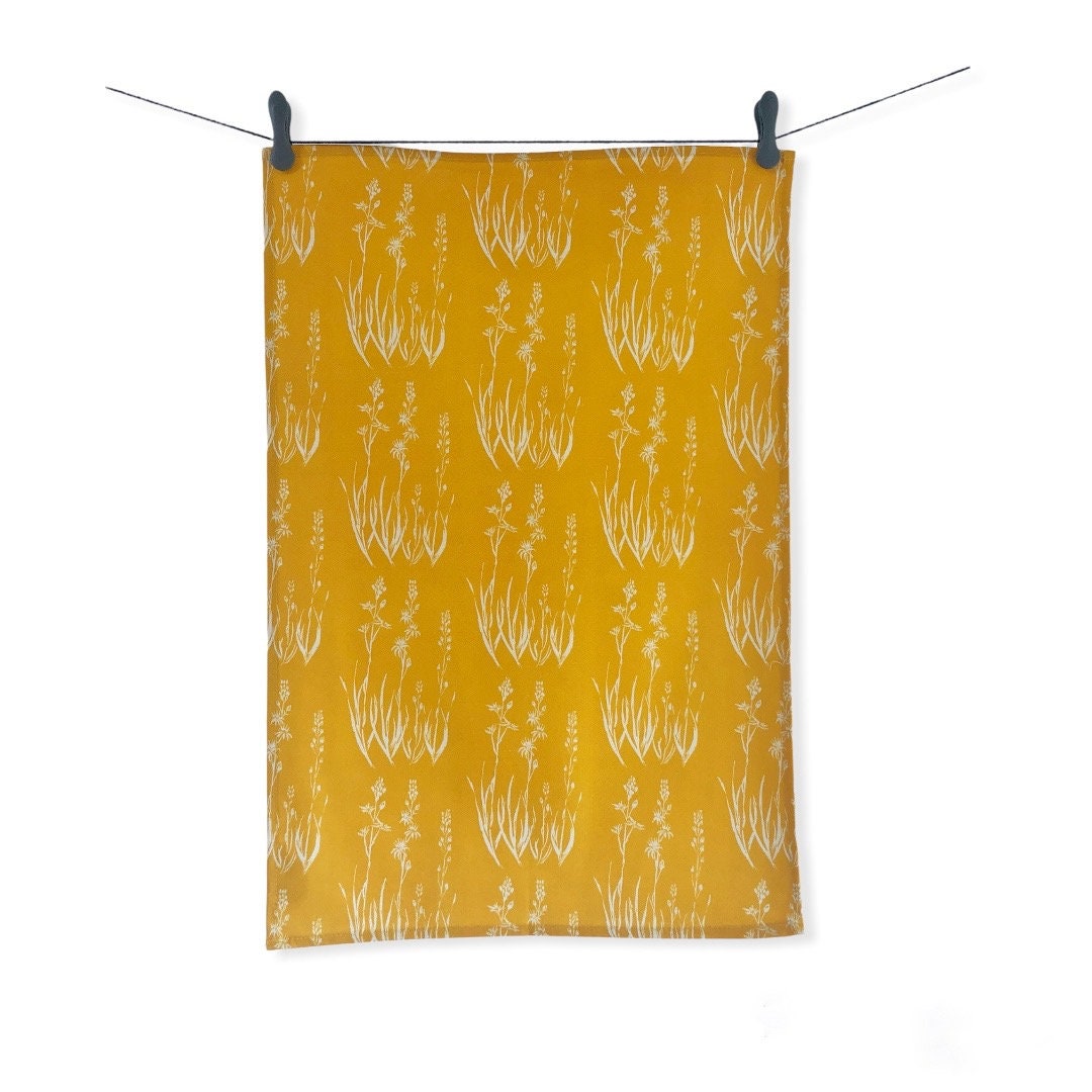 Ochre Tea Towel, 100% organic cotton with a wildflower design.